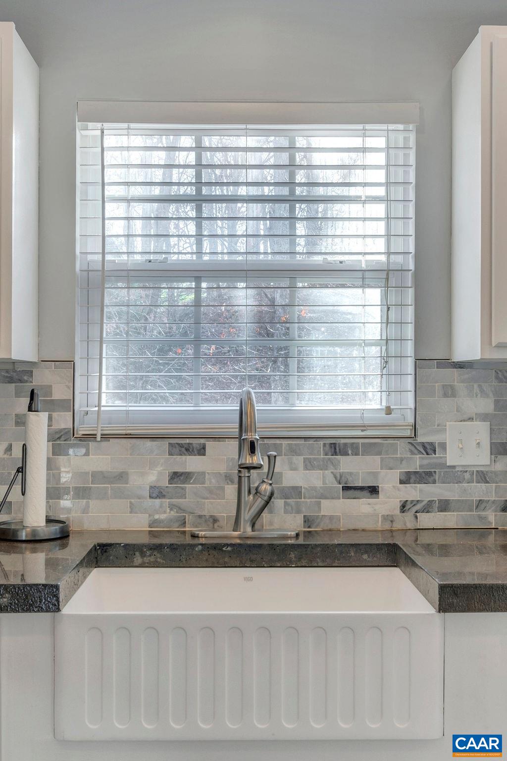 27 Zephyr Road Palmyra, VA 22963 - Photo 15 of 34 a kitchen with granite countertop a sink and a window