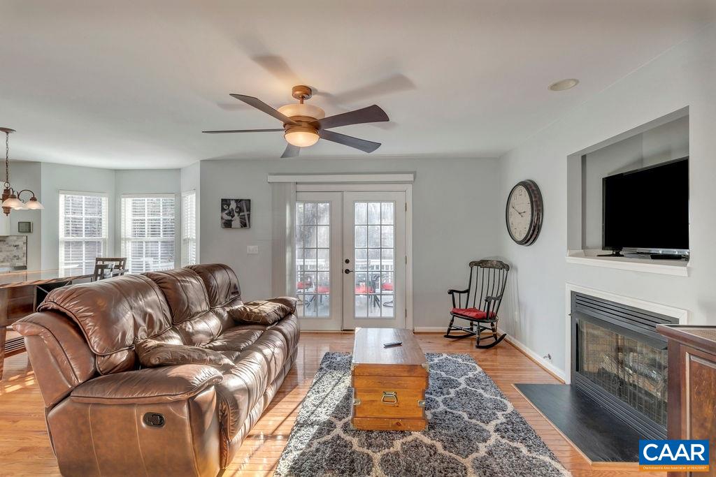 27 Zephyr Road Palmyra, VA 22963 - Photo 17 of 34 a living room with furniture fireplace and a flat screen tv