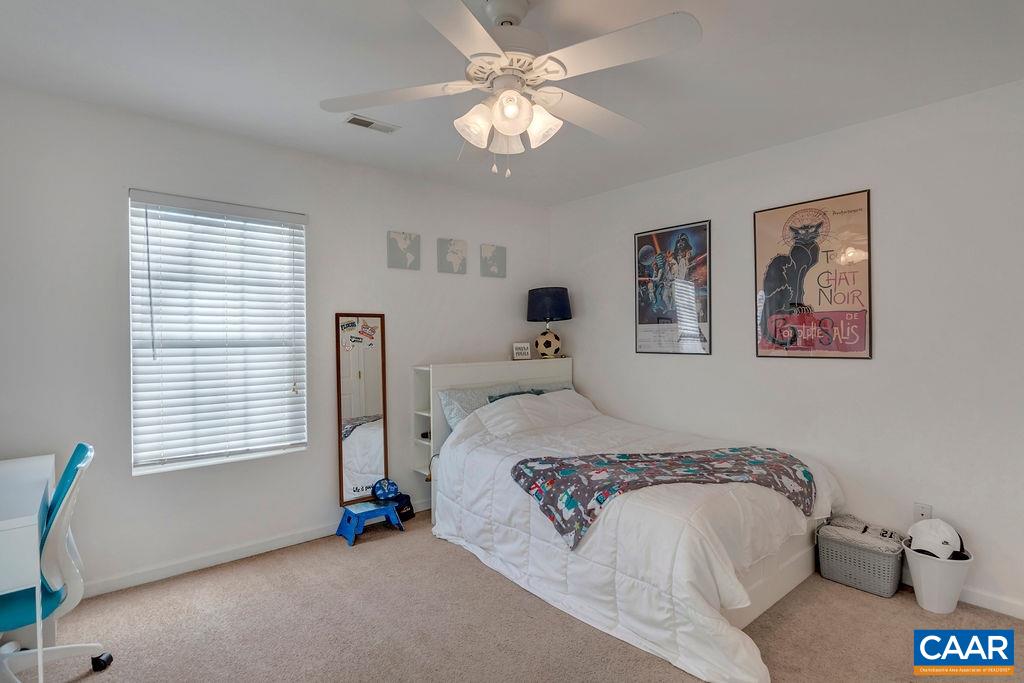 27 Zephyr Road Palmyra, VA 22963 - Photo 26 of 34 a bedroom with bed and a window