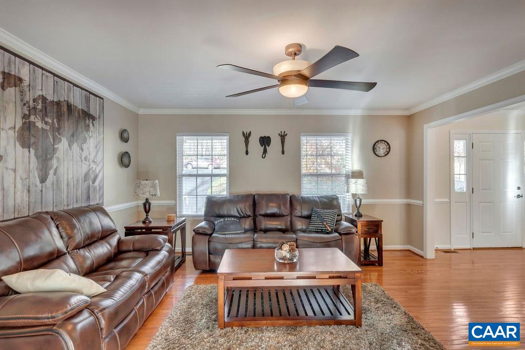 27 Zephyr Road Palmyra, VA 22963 - Photo 9 of 34 a living room with furniture and a large window