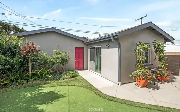 an aerial view of houses with outdoor space