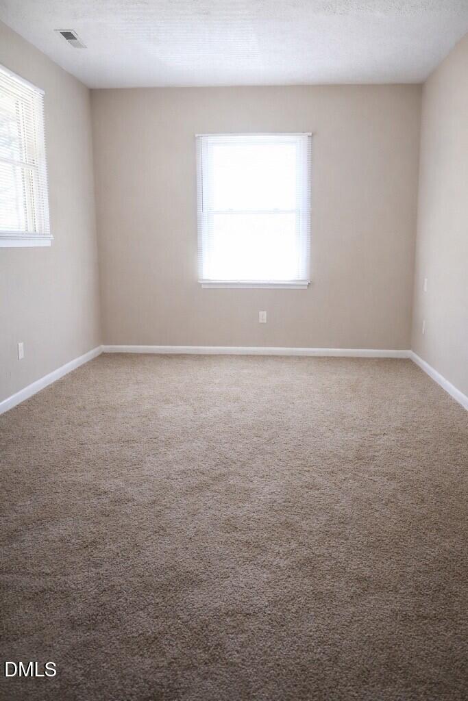 6591 Goldsboro Road Wade, NC 28395 - Photo 22 of 33 an empty room with a window