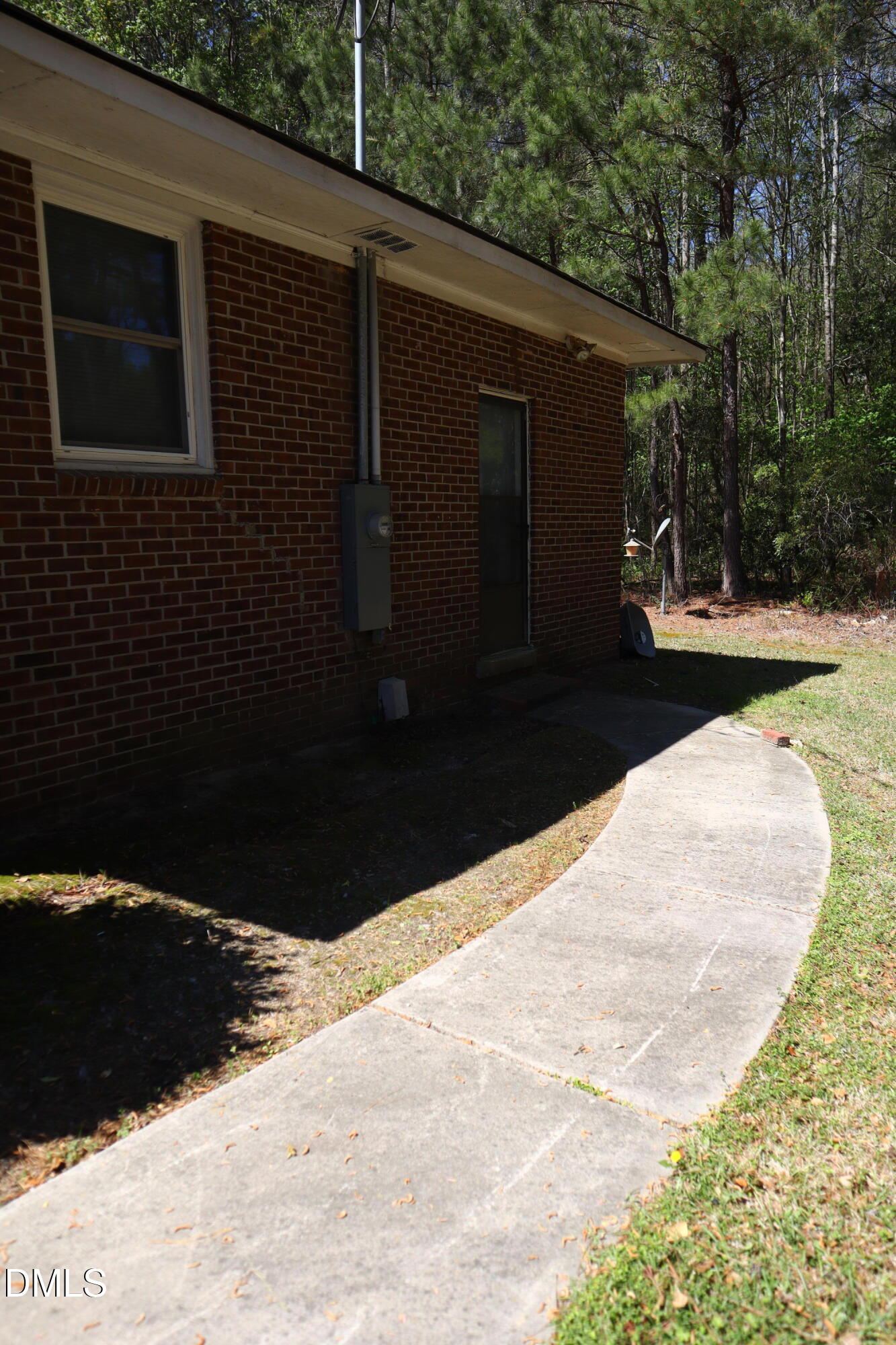 6591 Goldsboro Road Wade, NC 28395 - Photo 28 of 33 a view of a backyard of the house