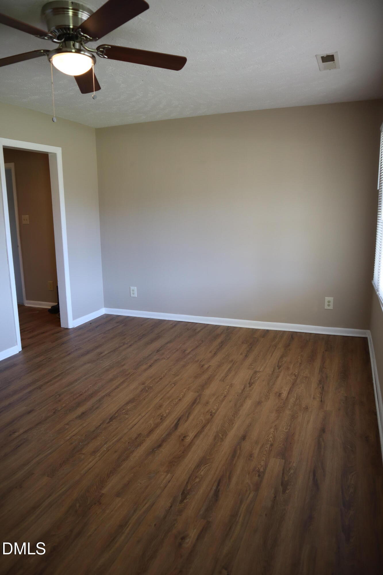 6591 Goldsboro Road Wade, NC 28395 - Photo 3 of 33 wooden floor in an empty room