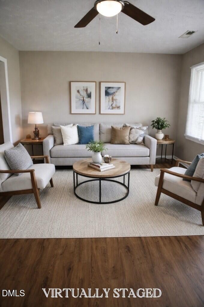 6591 Goldsboro Road Wade, NC 28395 - Photo 5 of 33 a living room with furniture and a rug