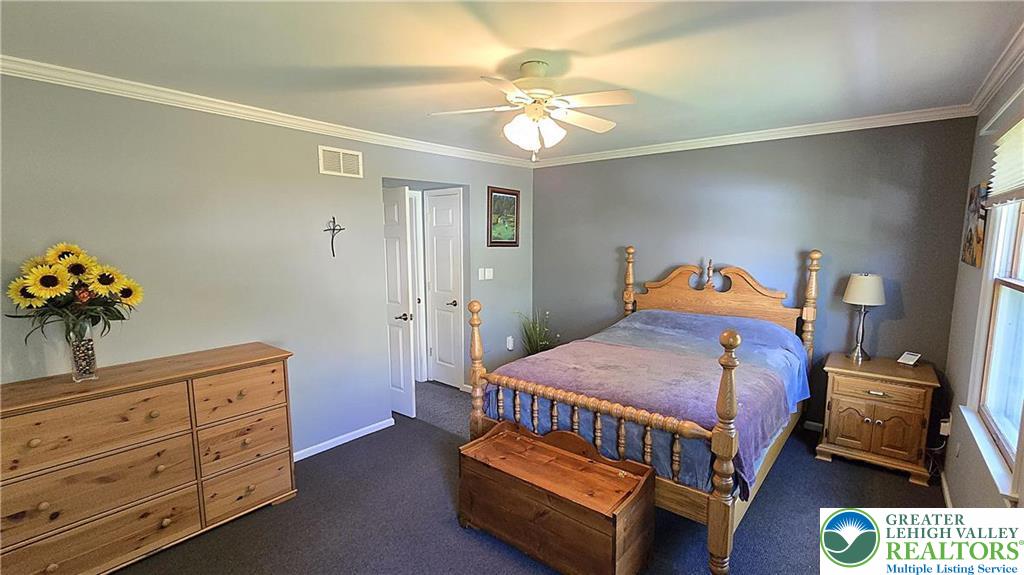194 Springhouse Road Allentown, PA 18104 - Photo 17 of 34 This cozy room offers a serene escape, perfect for unwinding after a long day.