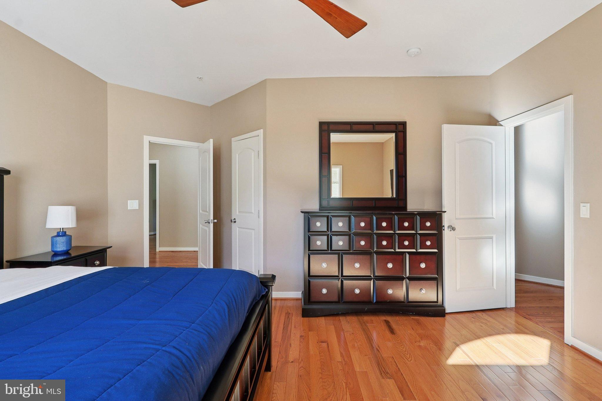 3211 Courtside Road Bowie, MD 20721 - Photo 64 of 108 Spacious bedroom with warm, inviting tones.