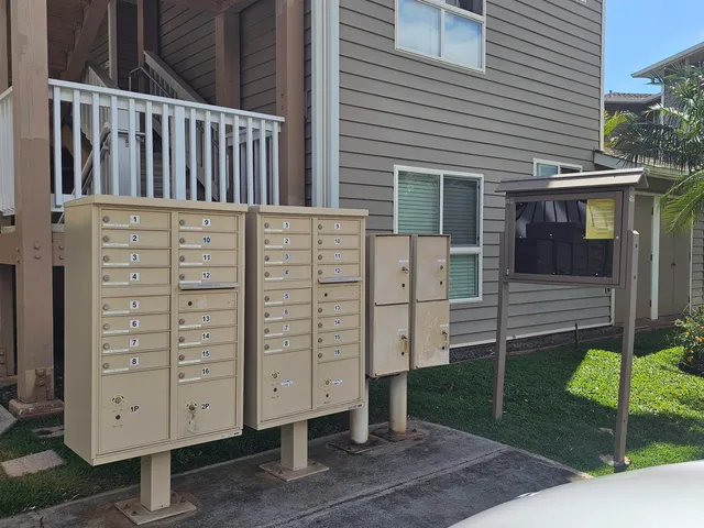a view of a wooden house and a fence