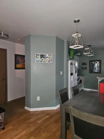 a workspace with furniture and window