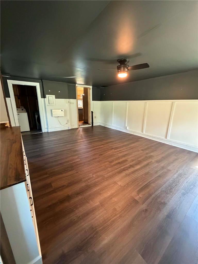164 Sand Spring Road Cresco, PA 18326 - Photo 40 of 60 Rich wood flooring grounds this versatile space, accented by a modern ceiling fan.
