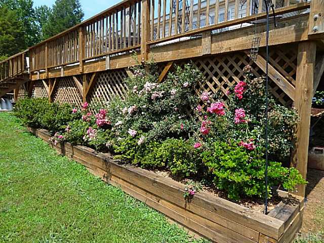 175 MacBeth Lane Roxboro, NC 27574 - Photo 17 of 24 A view of some of the beautiful, MATURE LANDSCAPING surrounding this home.