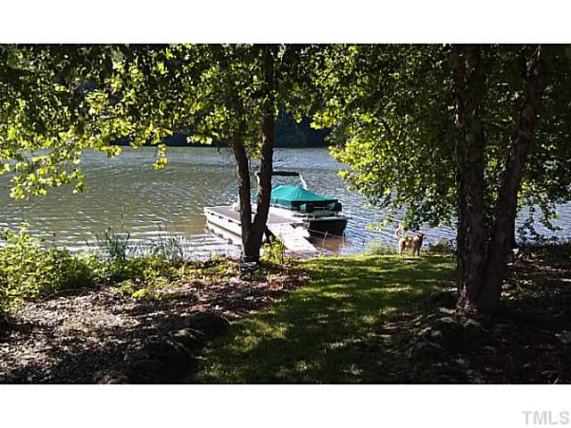 175 MacBeth Lane Roxboro, NC 27574 - Photo 2 of 24 175 Macbeth features a 8x24 FLOATING DOCK that conveys.