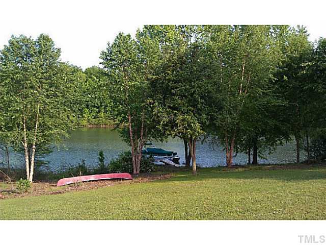 175 MacBeth Lane Roxboro, NC 27574 - Photo 3 of 24 A view of the lake from the BACK YARD showing just some of the 185' of NAVIGABLE WATERFRONT,