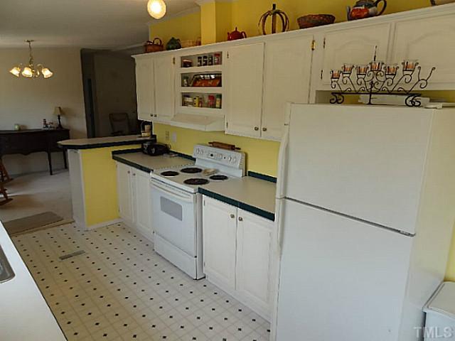 175 MacBeth Lane Roxboro, NC 27574 - Photo 9 of 24 The KITCHEN offers plenty of counter and cabinet space. All appliances convey.