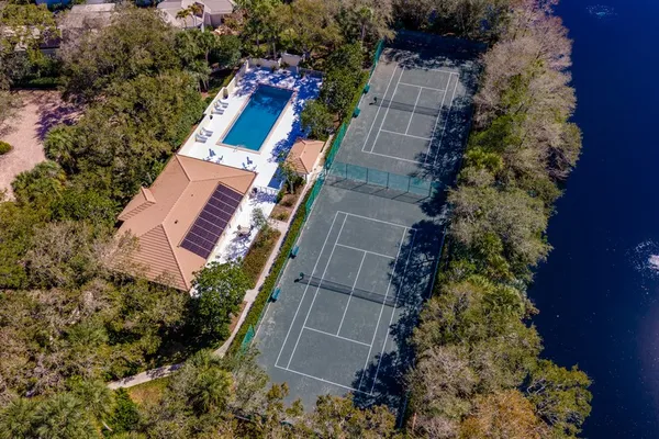 an aerial view of house with yard