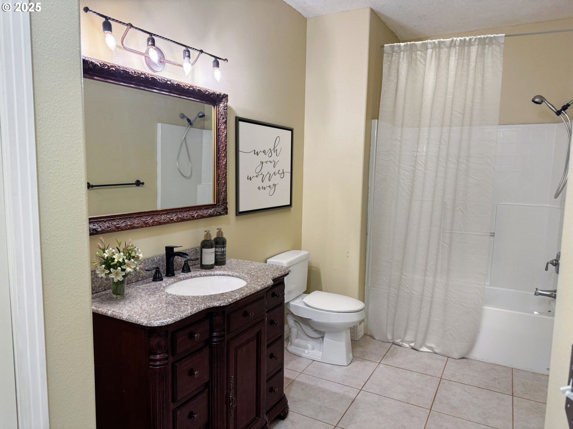 13728 Southwest 130th Place Portland, OR 97223 - Photo 13 of 24 a bathroom with a sink and a mirror