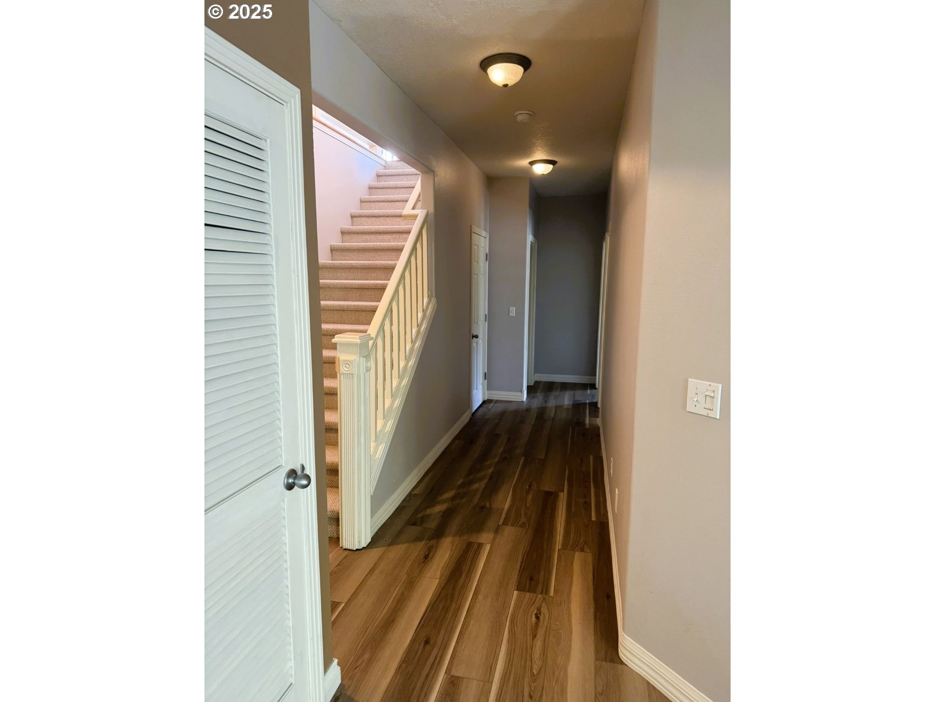 13728 Southwest 130th Place Portland, OR 97223 - Photo 15 of 24 a view of a hallway with wooden floor