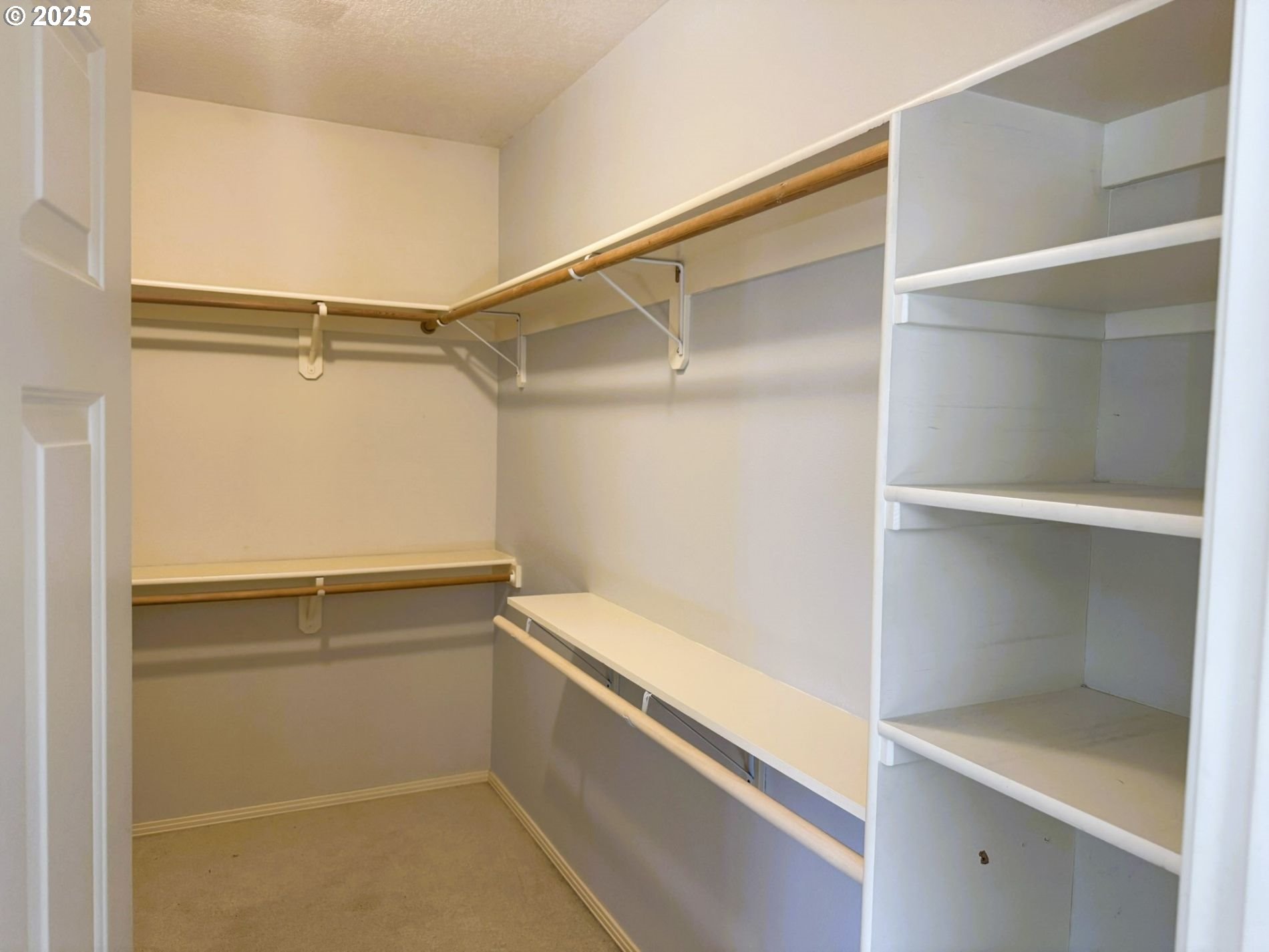13728 Southwest 130th Place Portland, OR 97223 - Photo 9 of 24 a view of an empty walk in closet
