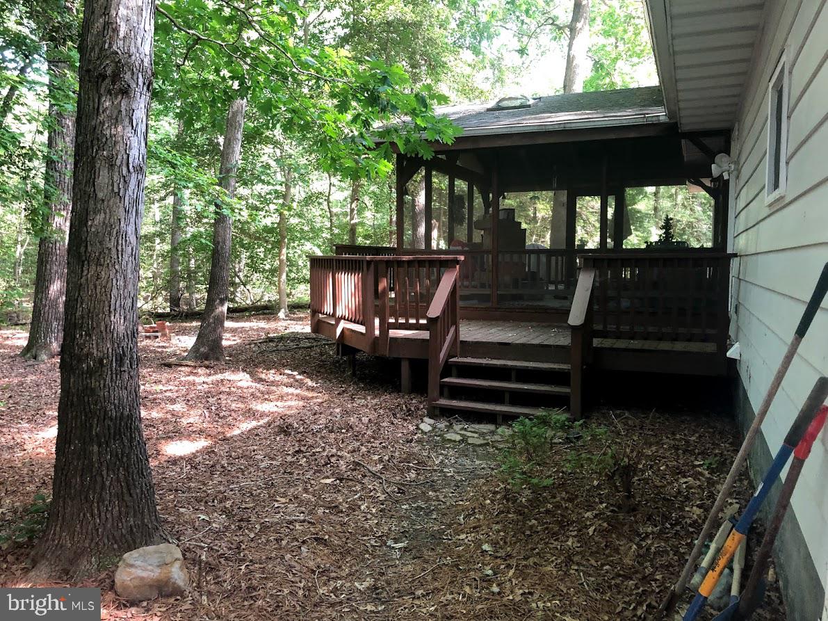 22230 Bull Road Leonardtown, MD 20650 - Photo 17 of 26 large back deck with screened in area