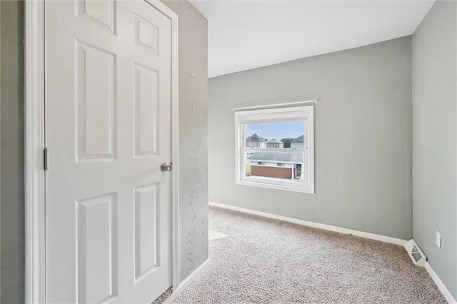 a view of a room with an entryway