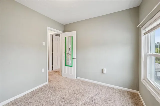 a view of small space with racks on the wall