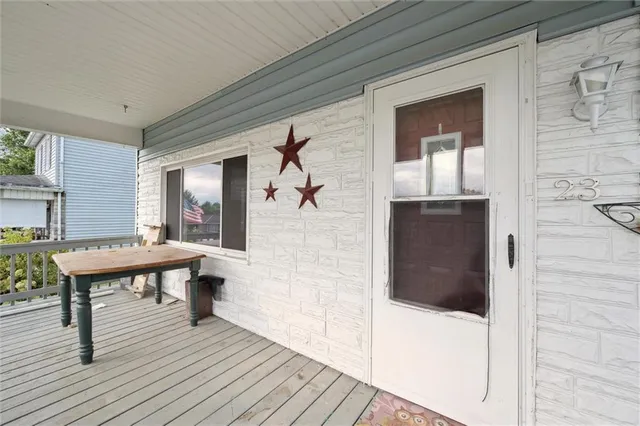 a view of a livingroom with furniture and wooden floor