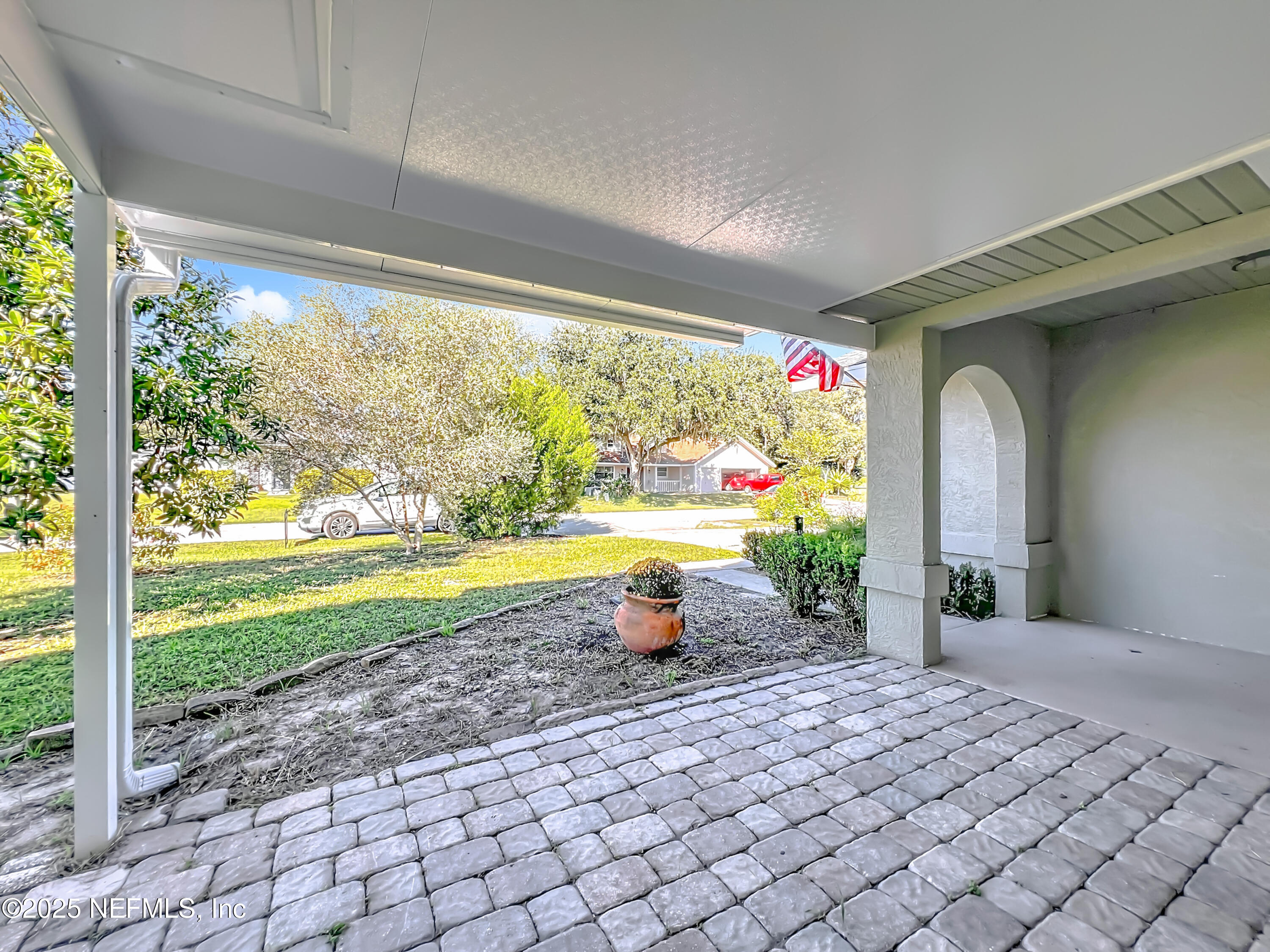 3061 South Franklin Terrace Inverness, FL 34450 - Photo 16 of 65 a front view of a house with a yard