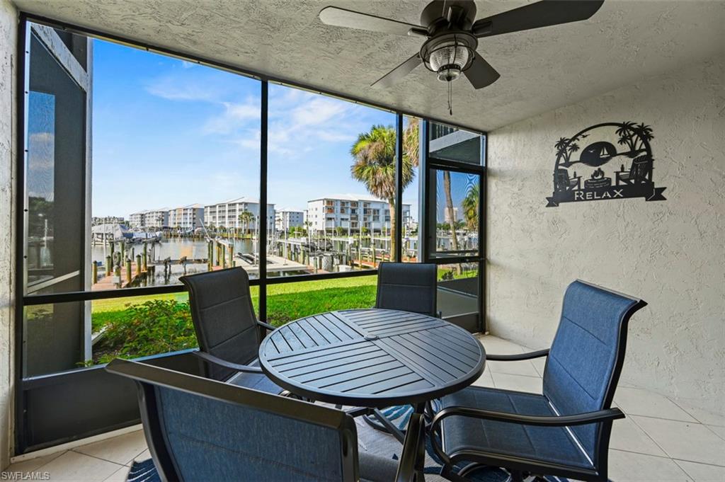 200 Lenell Road, Unit 215 Fort Myers Beach, FL 33931 - Photo 12 of 29 a view of a dining room with furniture window and outside view