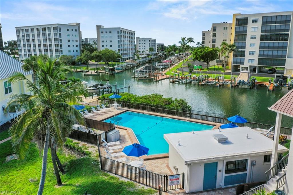 200 Lenell Road, Unit 215 Fort Myers Beach, FL 33931 - Photo 16 of 29 a aerial view of a house with a lake view