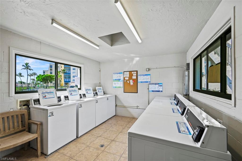 200 Lenell Road, Unit 215 Fort Myers Beach, FL 33931 - Photo 19 of 29 a living room with furniture and window