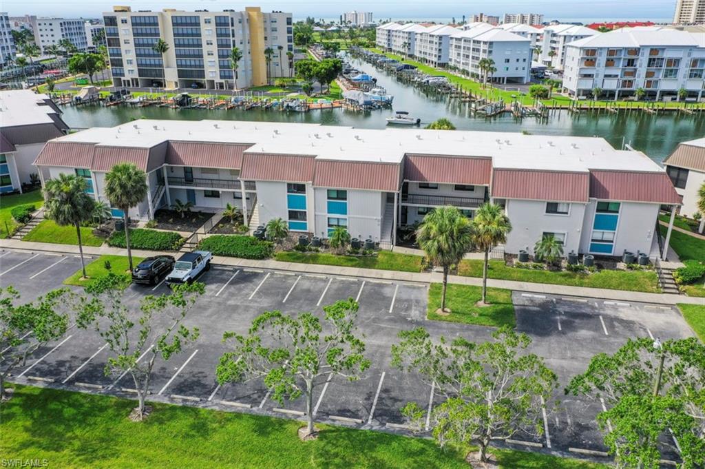 200 Lenell Road, Unit 215 Fort Myers Beach, FL 33931 - Photo 21 of 29 a view of a lake in middle of a city