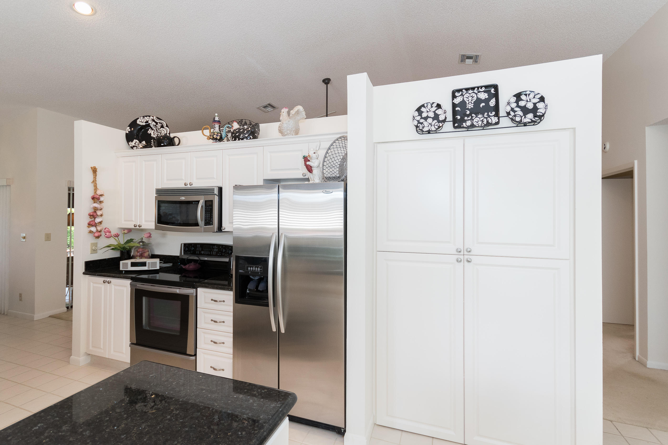 23465 Water Circle Boca Raton, FL 33486 - Photo 19 of 42 Kitchen Pantry