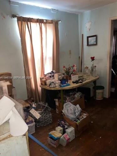 1129 Northwest 105th Street Miami, FL 33150 - Photo 5 of 12 a room with furniture and large windows