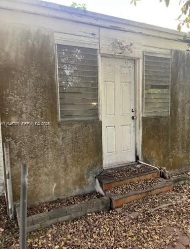 1129 Northwest 105th Street Miami, FL 33150 - Photo 9 of 12 a view of a door