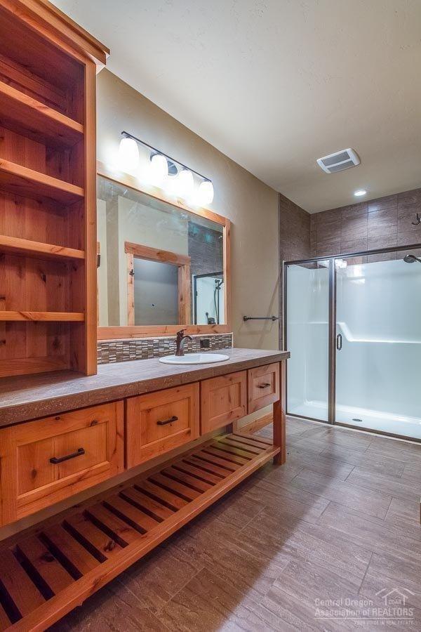 136 Sunstone Loop Bend, OR 97707 - Photo 11 of 20 Guest bathroom with large vanity. Photo
