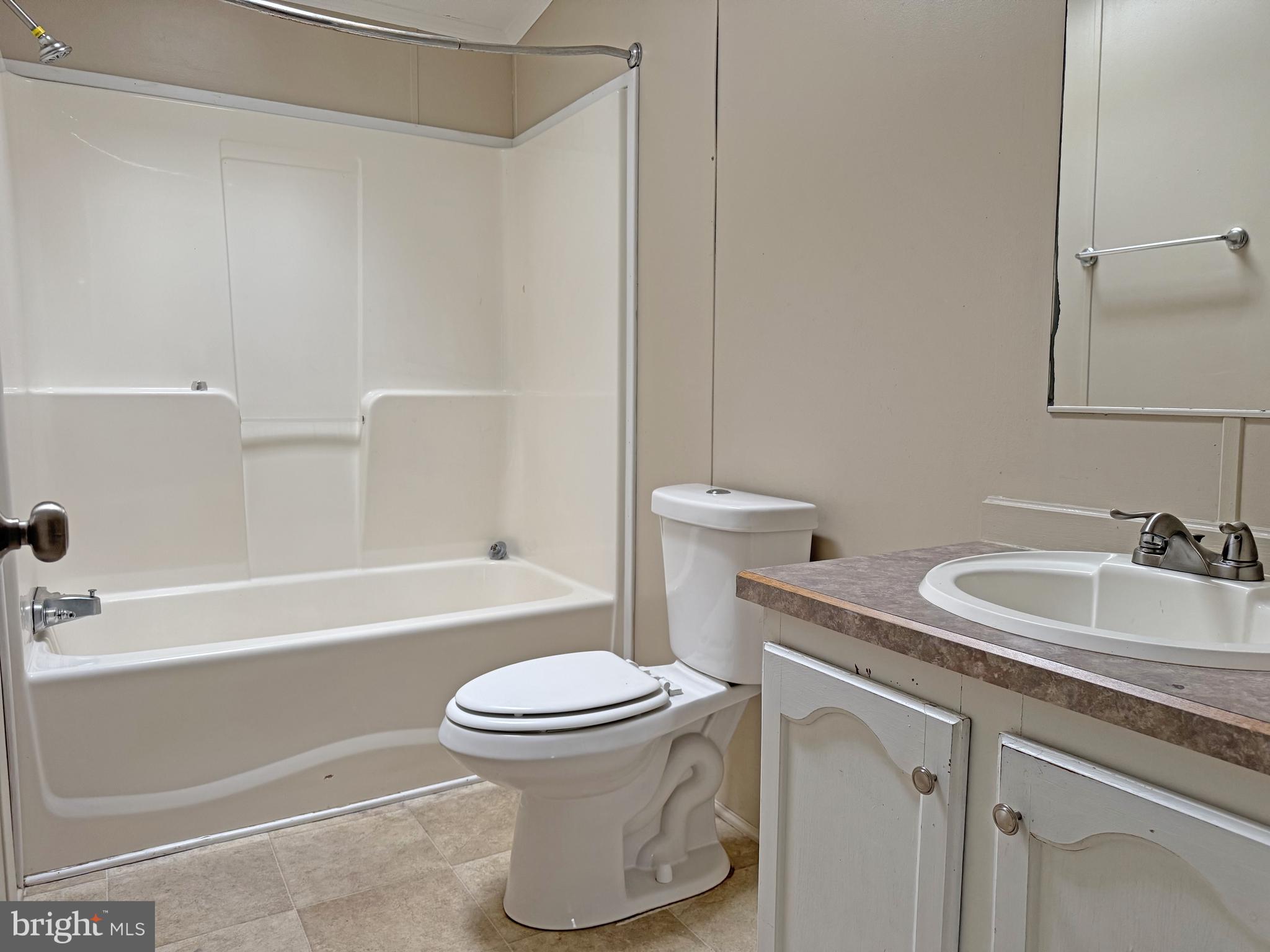 238 Silver Leaf Lane Dover, DE 19901 - Photo 13 of 20 a bathroom with a sink toilet and shower