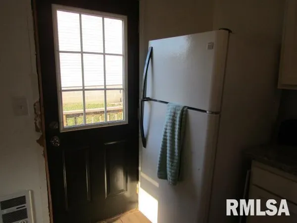 a view of walk in closet with window
