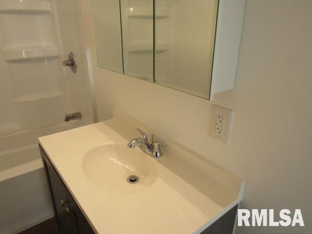 1506 Hillside Road Rosiclare, IL 62982 - Photo 17 of 29 a bathroom with a sink and a shower