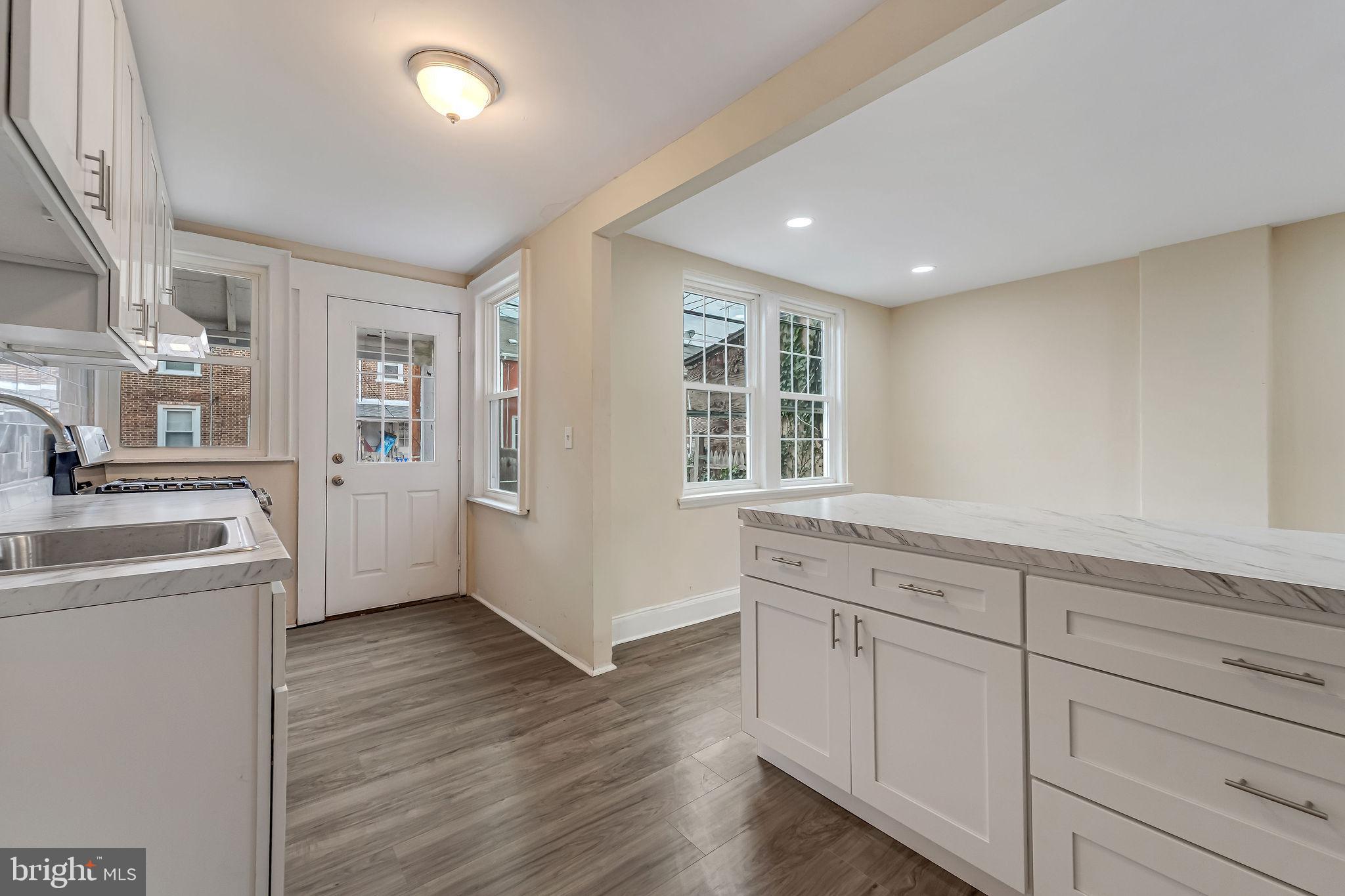 1029 Ironside Road Camden, NJ 08104 - Photo 10 of 25 a view of a kitchen counter space with wooden floor
