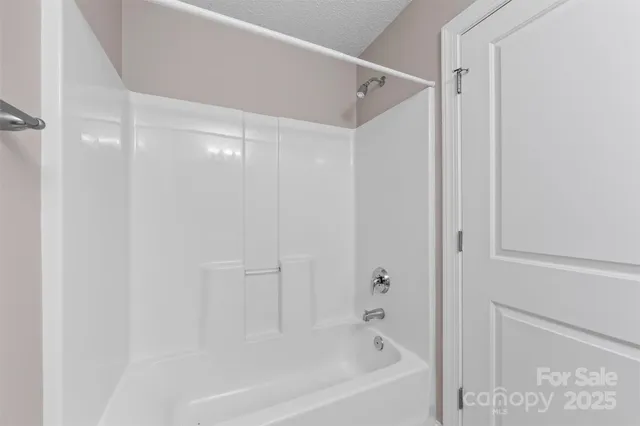 a close view of a bathtub in bathroom