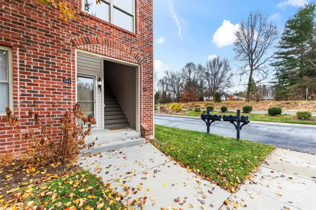 a view of a bench in front of house