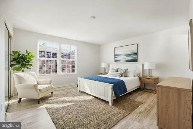 a bed room with a bed and a couch