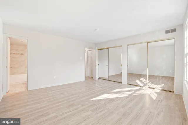 a view of a livingroom with wooden floor