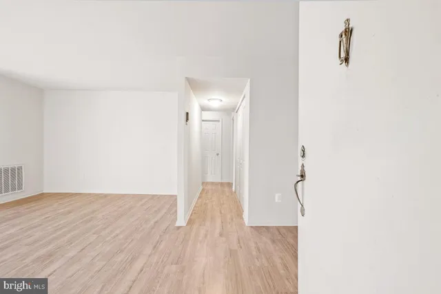 a view of a livingroom with wooden floor