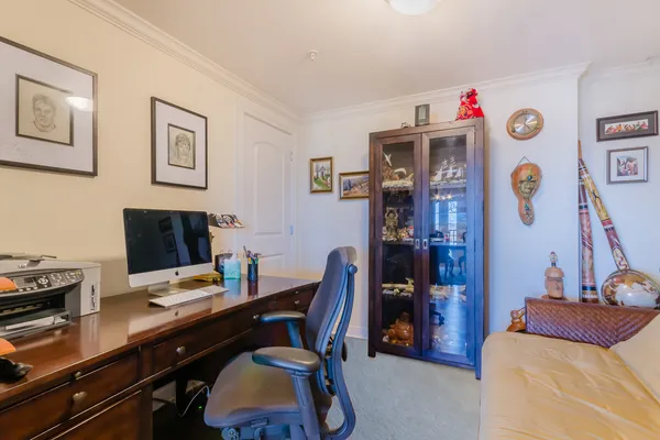 a view of a workspace with furniture