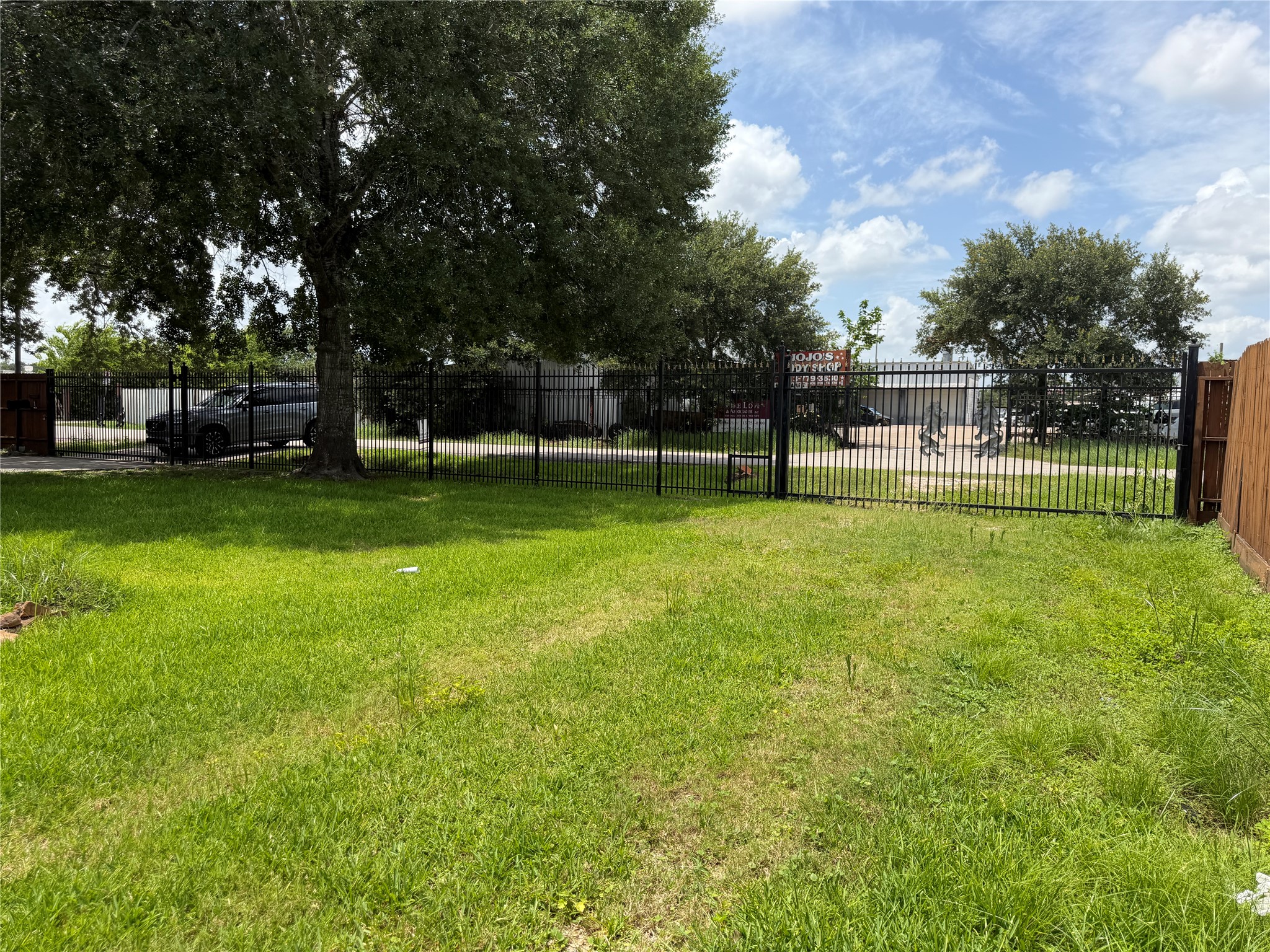 6009 Maple Street Houston, TX 77074 - Photo 11 of 11 a view of a park with large trees