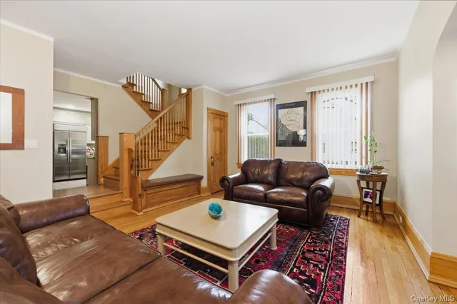 a living room with furniture and a rug