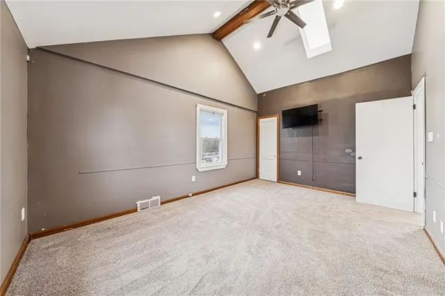 a view of empty room with windows