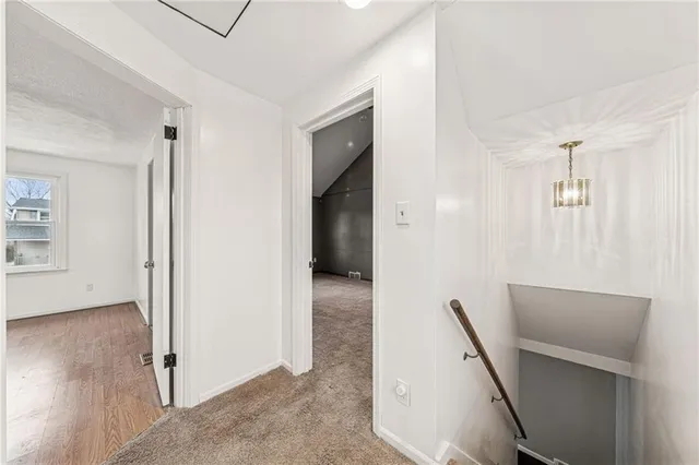 a view of kitchen with furniture and a window