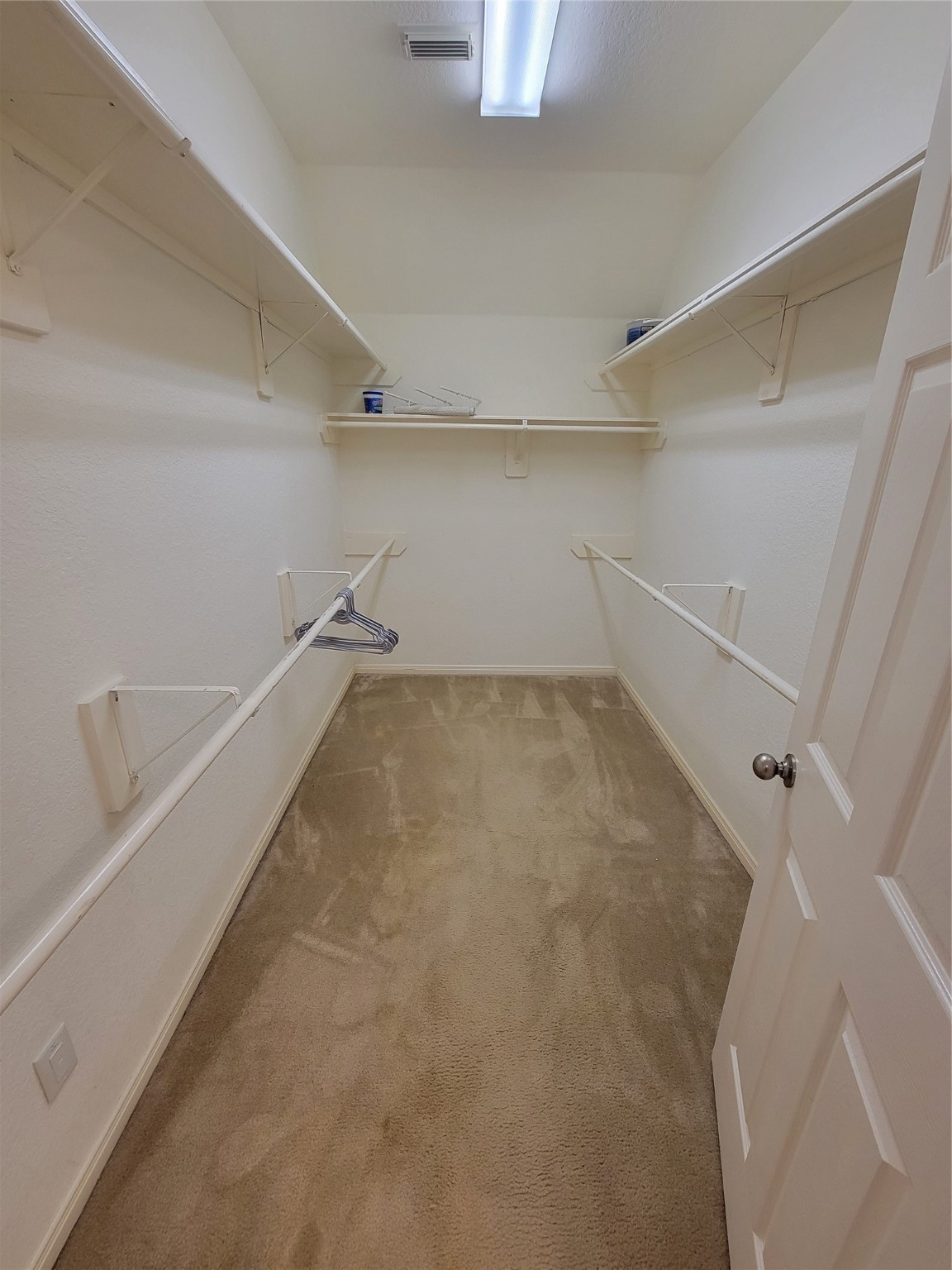 130 Zephyr Bend Place The Woodlands, TX 77381 - Photo 13 of 29 a view of a room with an empty space